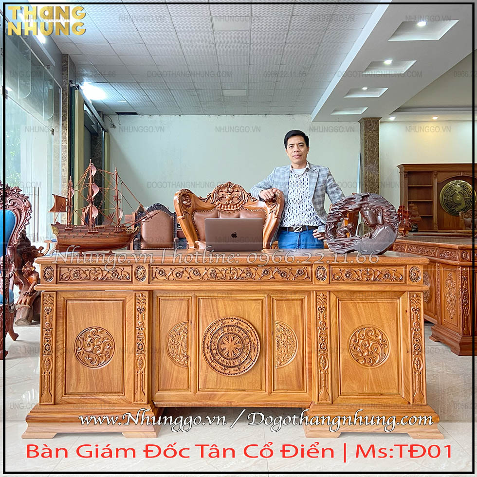 Bàn lãnh đạo mẫu trống đồng gỗ gõ đỏ kích thước 175cm được thiết kế theo phong cách tân cổ điển đục hoa văn trống đồng mang đậm nét văn hoa Việt Nam