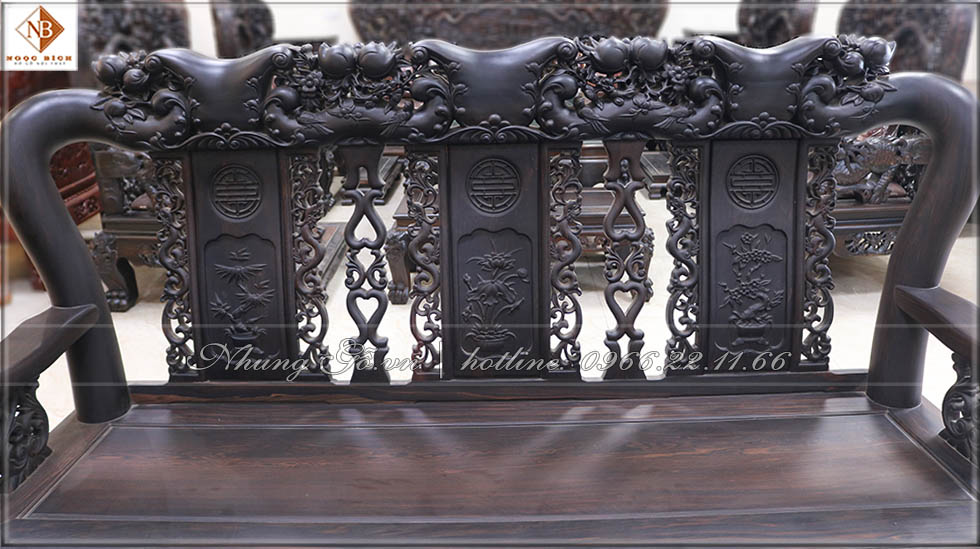Đoản dài bộ bàn ghế quốc đào gỗ mun hoa văn hoa lá tây uốn lượn được trạm khắc rất tinh sảo , mềm mại
